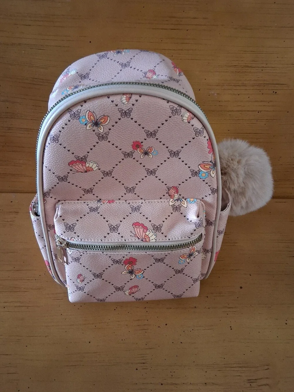 Dreamers Pink Butterfly Mini Backpack with Beige Faux Fur Pom